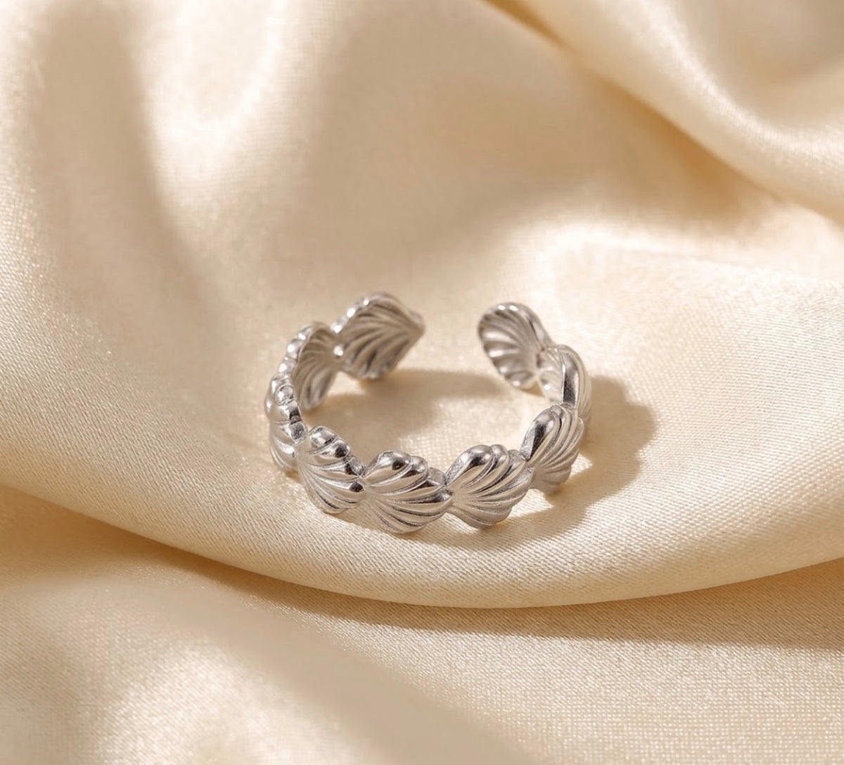 Silver linked shell ring